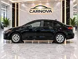 2025 Toyota Corolla LE Sedan, foto 6 de 16