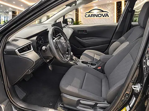 2025 Toyota Corolla LE Sedan, foto 9 de 16, auto usado en venta en CARNOVA Dallas